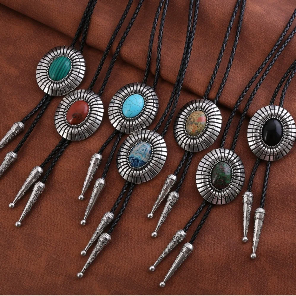 New silver black leather bolo tie. I have MANY others styles Available